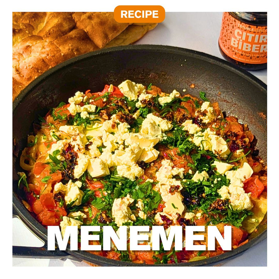 Menemen Turkish scrambled eggs with tomatoes, peppers, white cheese and Citir Biber crispy chilli oil