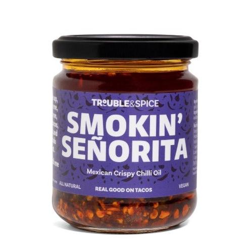 Jar of Smokin’ Señorita Mexican crispy chilli oil - chili olie by Trouble & Spice, inspired by salsa macha, with a purple label.