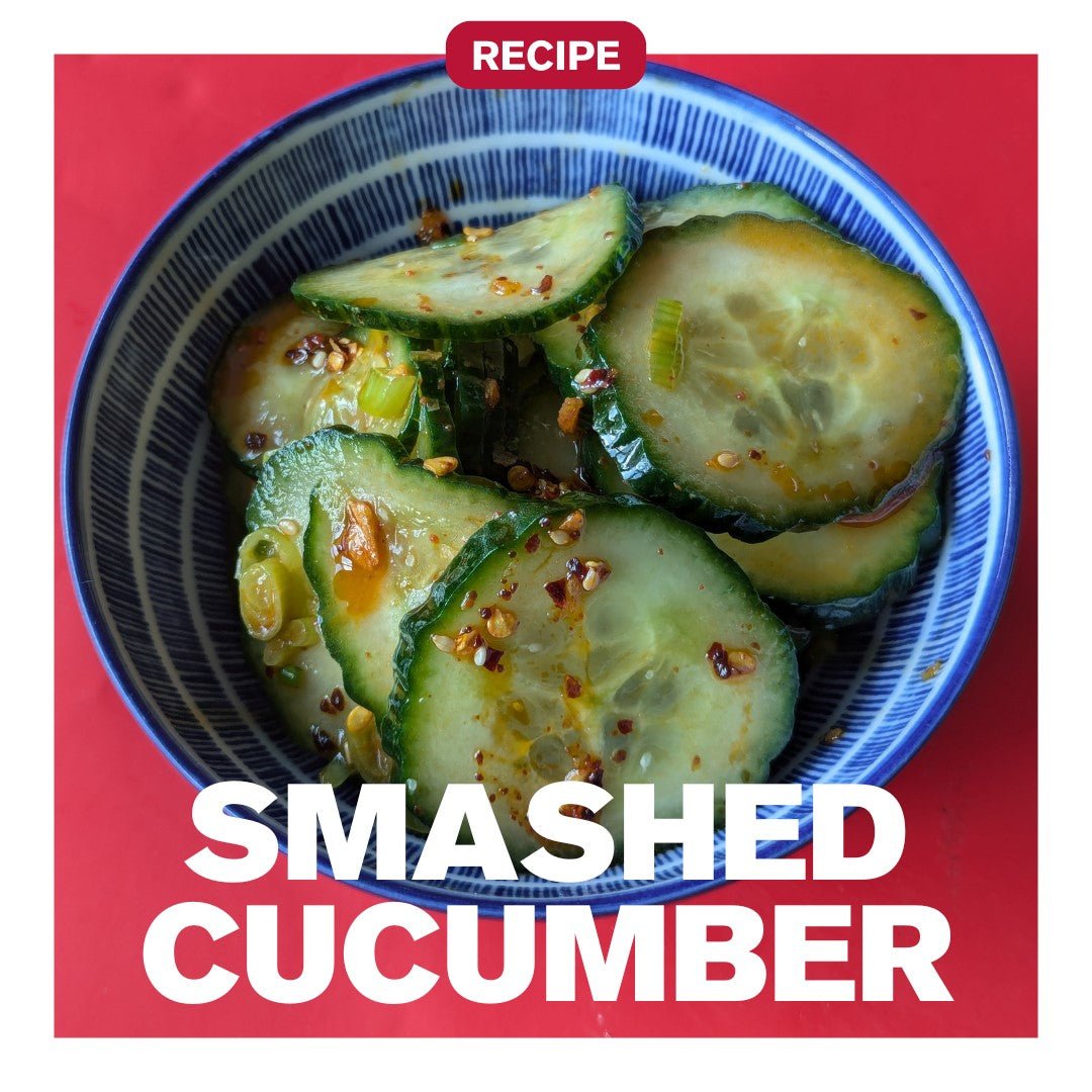 Chinese smashed cucumber salad with spring onion, sesame oil and Crunchy Spice crispy chilli oil